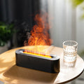 Emberwick flame diffuser with orange flame effect on a wooden table
